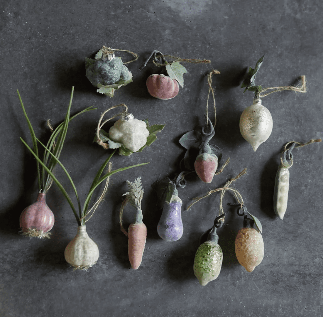 assorted vegetable garden ornaments
